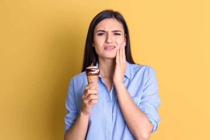 Tooth Sensitivity - Symptoms, Causes, and Treatment